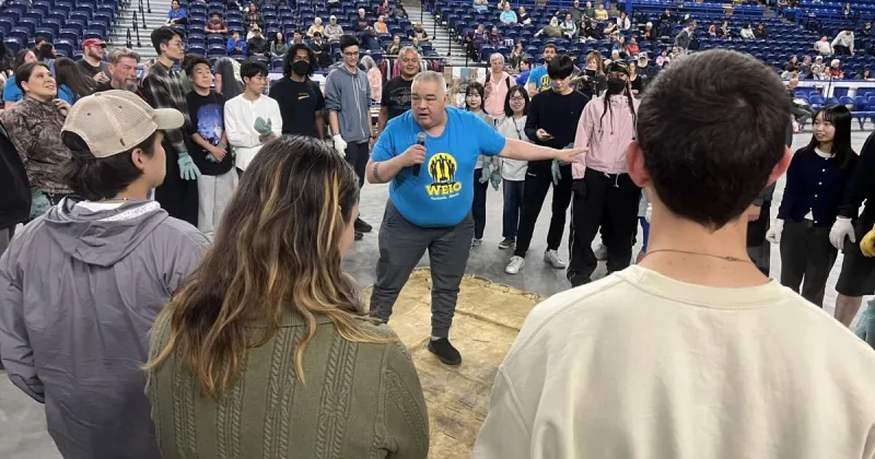 Master of the blanket toss makes sure the event is safe and fun