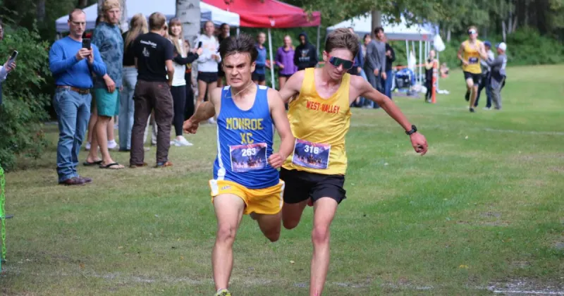 Photo finishes, Wolfpack dominance highlight North Pole XC Invite