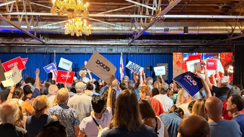 Doug Jones brings campaign rally to Mobile, focuses on rising costs