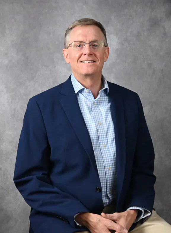 Mark Ennis returns as director of OPS