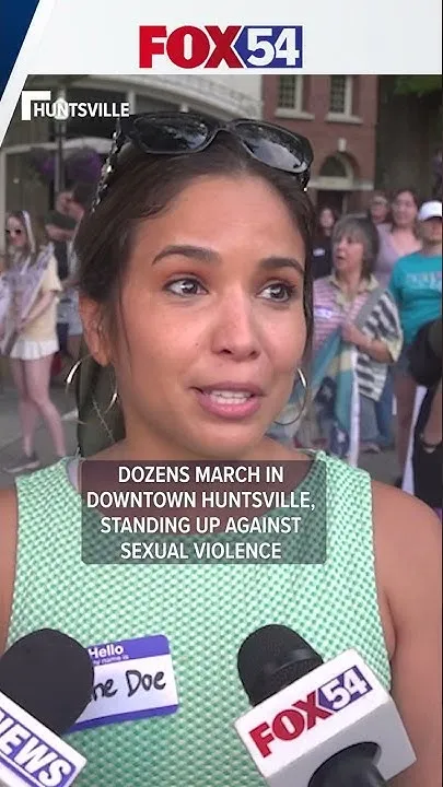 Dozens rally against sexual violence with march in downtown Huntsville (Video)