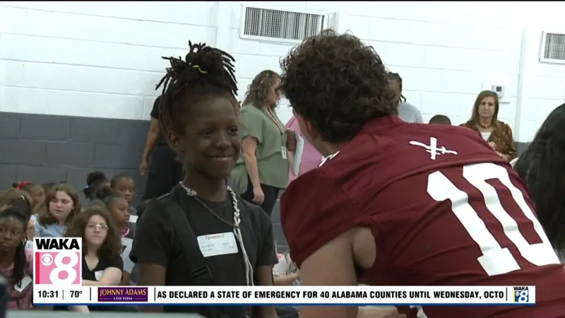 Trojans help donate shoes to a local elementary school