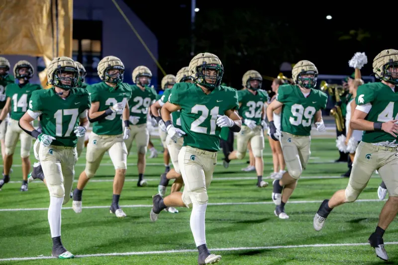 Spartans win in rain over Calera