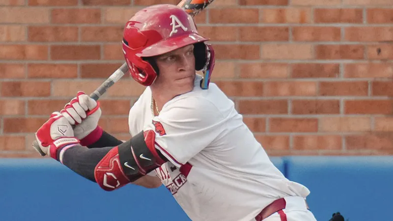 Arkansas burned seven pitchers, blew a 5-0 lead and lost to Kansas