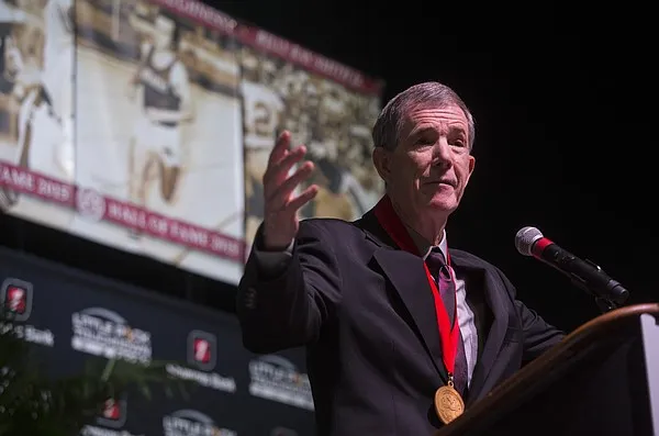 Where Are They Now: Arkansas great Bill Burnett took plenty of hits but never lost the ball