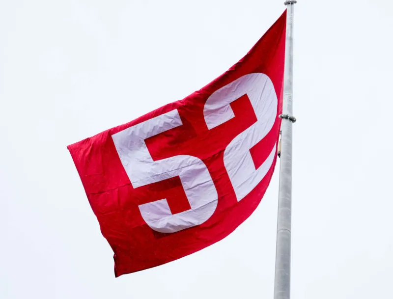 Raising Flag No. 53 for track & field national championship