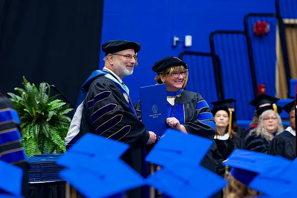Assistant principal returns from Japan for SAU doctoral commencement