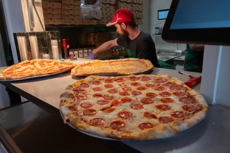 Mad Slice opens in former Iriana's space with $5 slices and both New York and Chicago-style pies