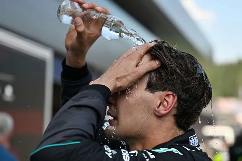 Russell survives heat, Verstappen's challenge