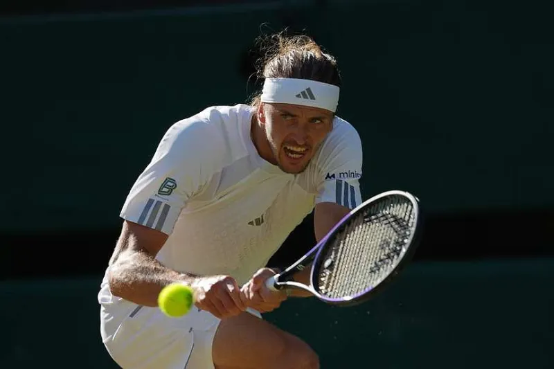 Defending champ, No. 2 seed ousted