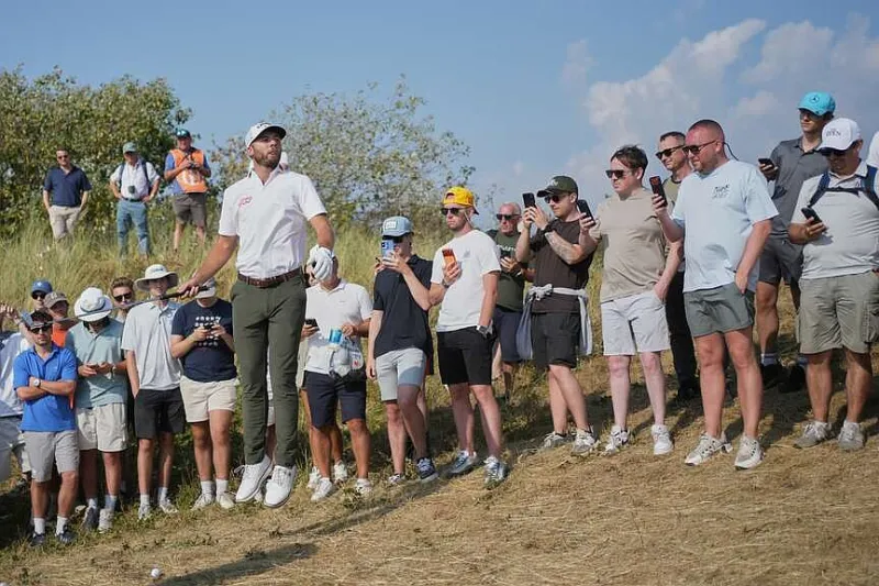 Burns leads Open he planned to miss