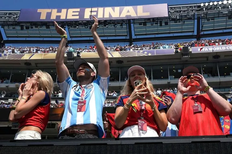 They sing, they stomp, they dance. World Cup fans from Argentina, Spain spent cash at the final