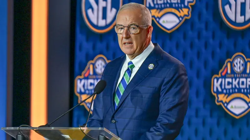 SEC commissioner Greg Sankey with the electronic media in Tampa