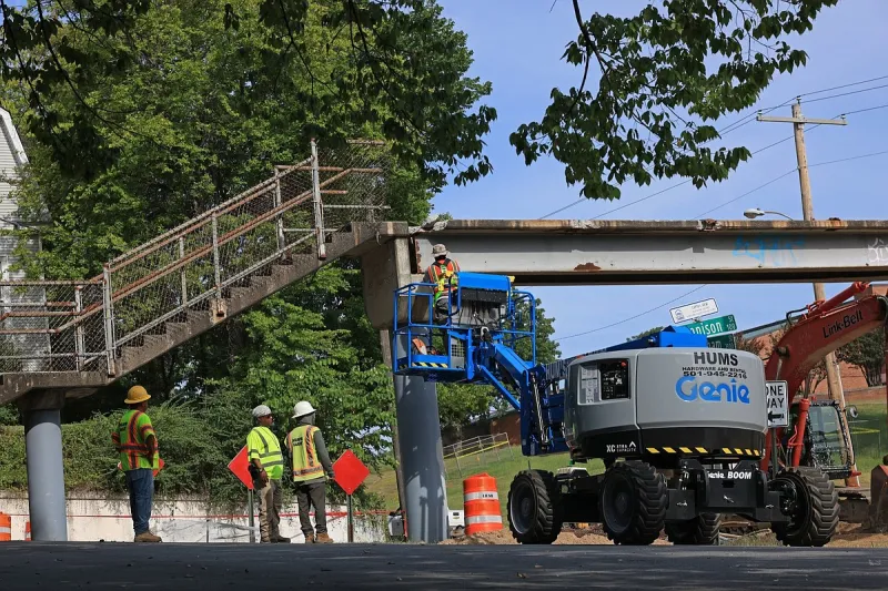 Boom was not lowered on truck that struck West Markham Street pedestrian bridge, affidavit says