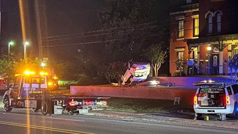 Car flips after ASP chase, downing wire and cutting power of the 1836 Club
