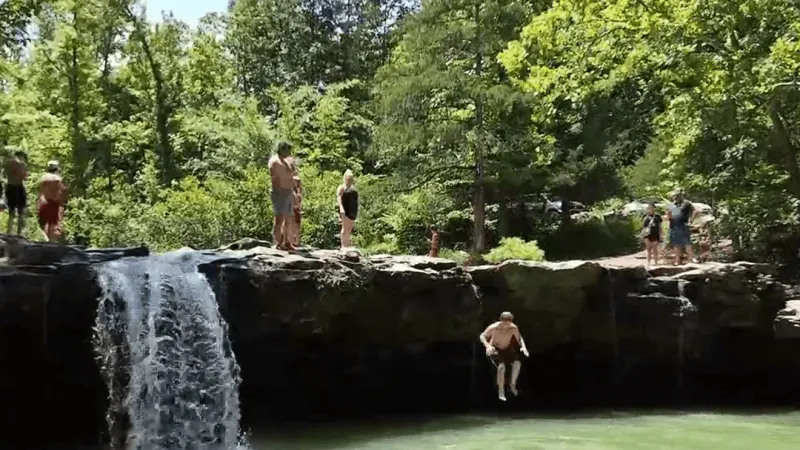Summer heat draws families back to Falling Water Falls in Pope County