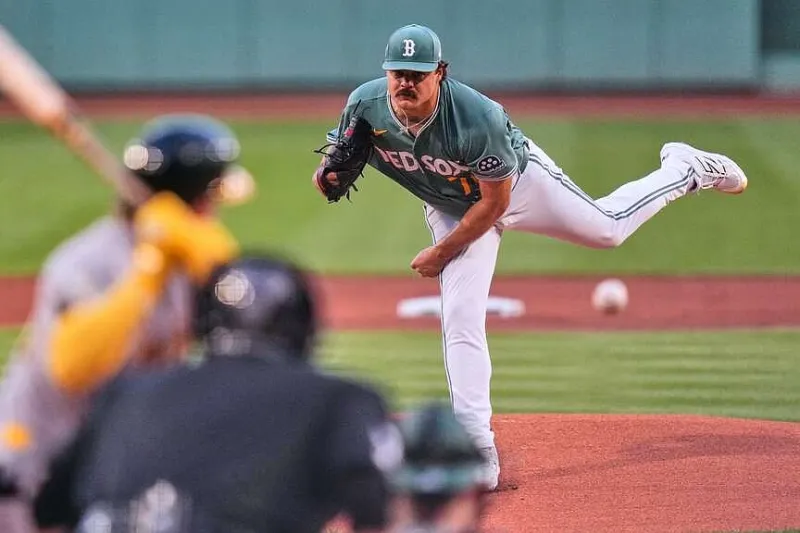 Tolle strikes out 14 A's; Red Sox run streak to 9