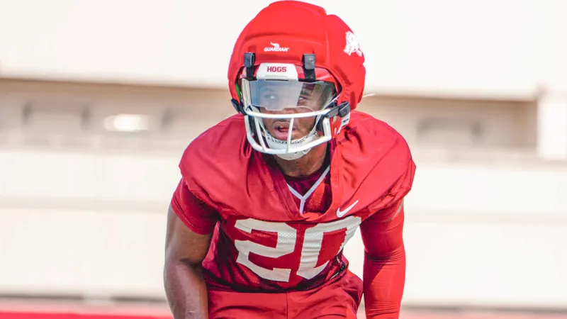 Razorbacks' Johnson, Lewis, Harrison after practice on Sunday