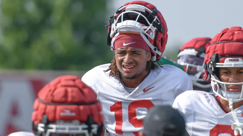 Coach Larry Smith sees a "night and day" change in Arkansas 'X'