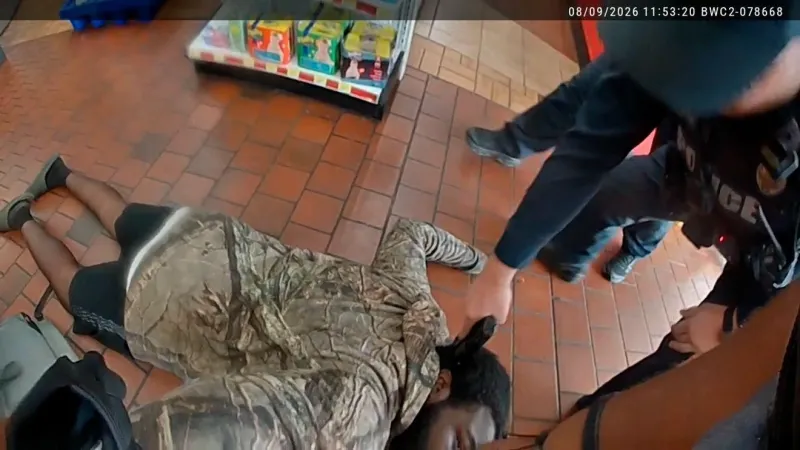 LRPD officer placed on leave after holding gun to unarmed man's head during arrest