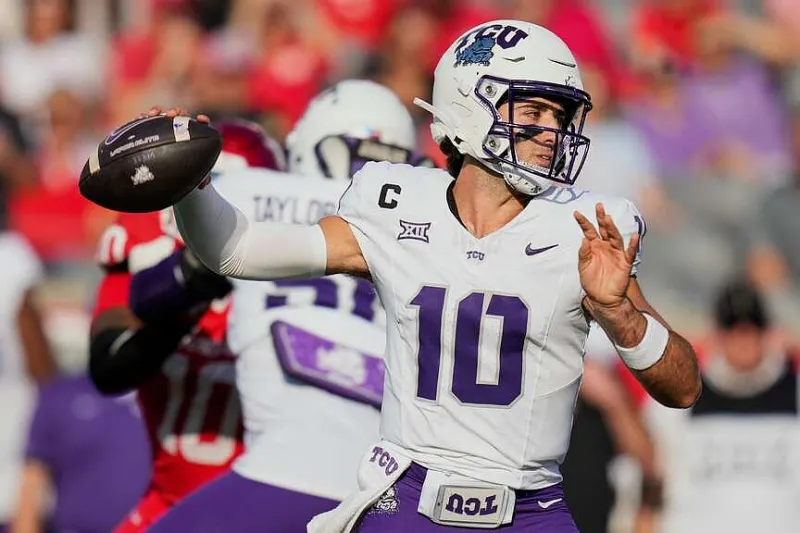 QB Josh Hoover faces new challenge in replacing Heisman winner on defending champion Indiana