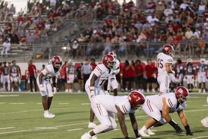 Reddies Ride Past Storm, Take Season Opener 57-21