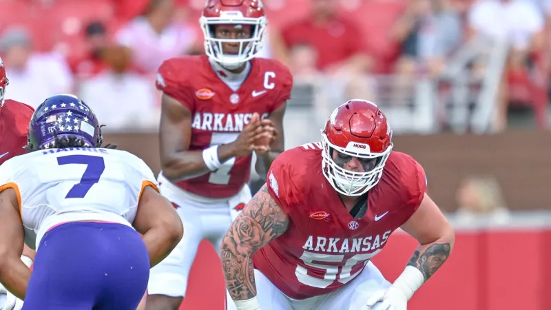 Former Razorback, NFL player Grant Cook on offensive line for Hogs