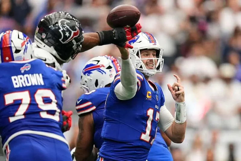 Josh Allen connects with Joshua Palmer for a late TD as Bills beat Texans 36-31 in wild opener