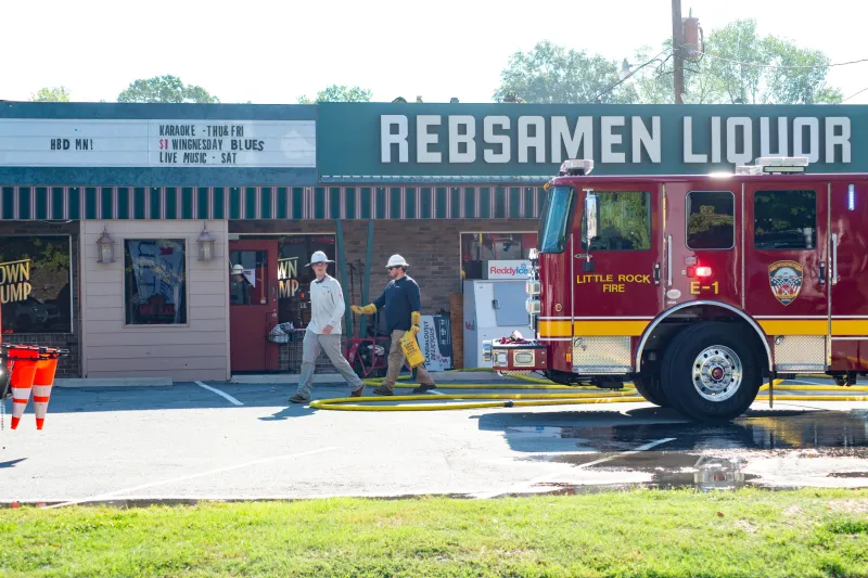 Fire trucks respond to smoldering Rebsamen Liquor call