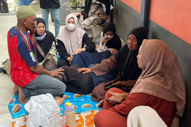 Searches magnified for 129 still missing after ferry capsized