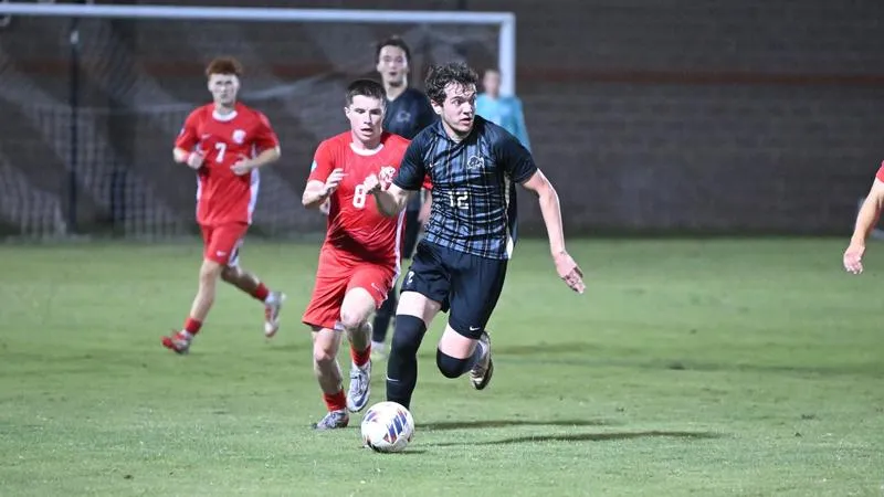 Late Crimson Storm Surge Sinks Bisons in GAC Opener