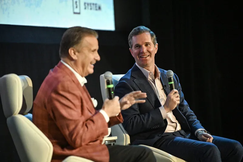 Kentucky Gov. Andy Beshear and Razorbacks coach John Calipari talk politics and basketball during appearance in Little Rock