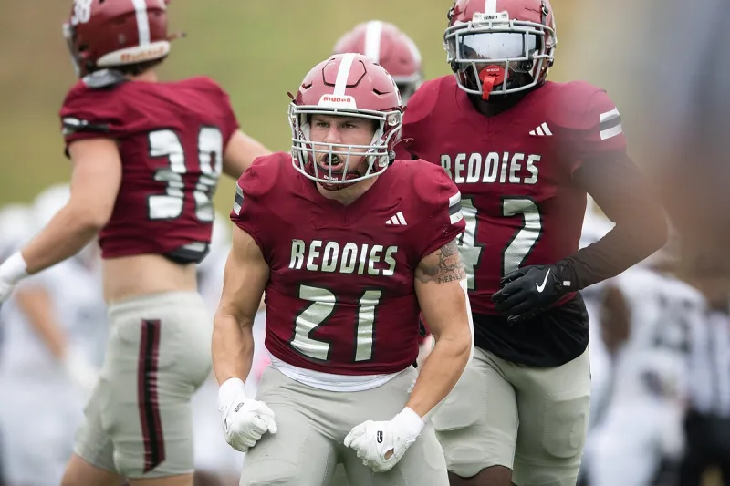 Reddies hold off upset bid, rally to improve to 5-0