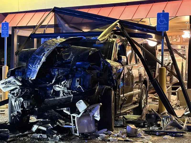 Police report: Driver who crashed into Waffle House killing an employee had argued with boyfriend