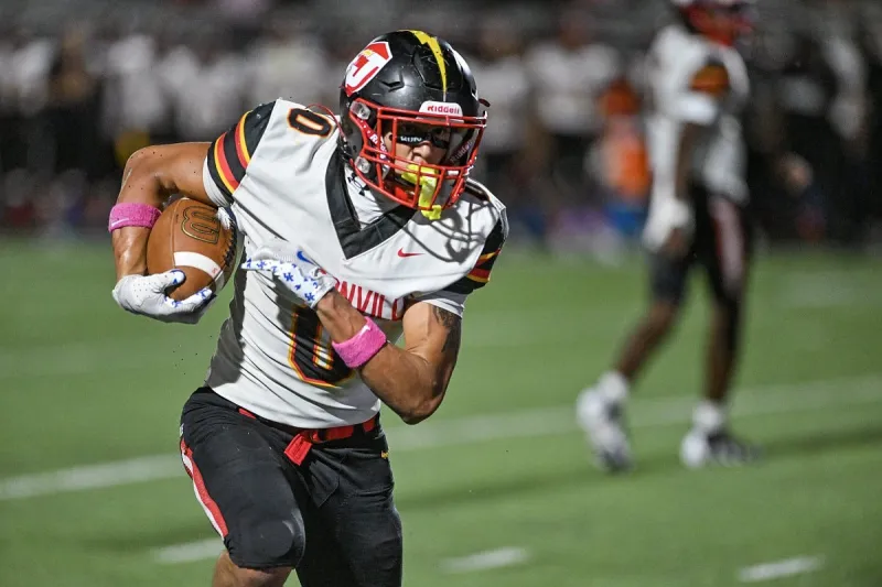 Jacksonville romps by Greenbrier; Titans' Mason Ball scores five rushing touchdowns