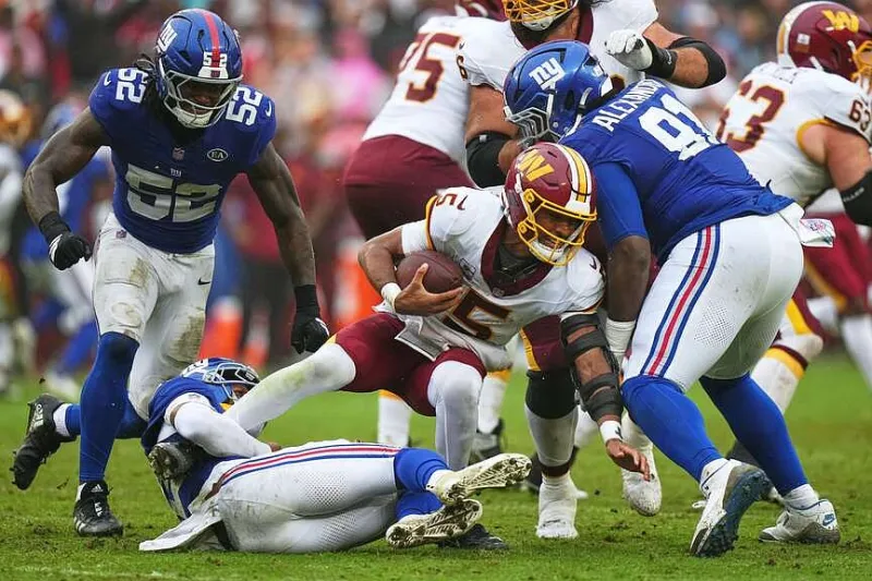 Jayden Daniels returns and scores twice, but overtime gaffe costs Commanders in 27-27 tie vs. Giants