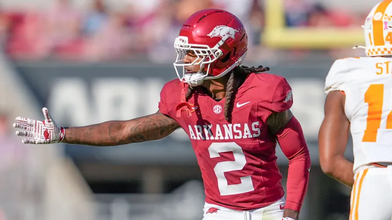 Razorback tight end Ty Lockwood, defensive back Shelton Lewis