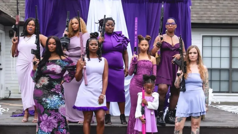 Guns, gowns and a message: Women 'Aim for Change' during Domestic Violence Awareness Month