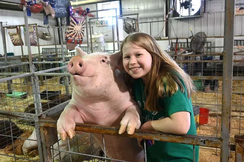 Just a girl and her pig
