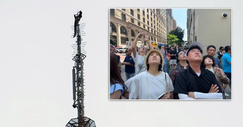 Daredevil couple climb spire atop Empire State Building in apparent marriage proposal
