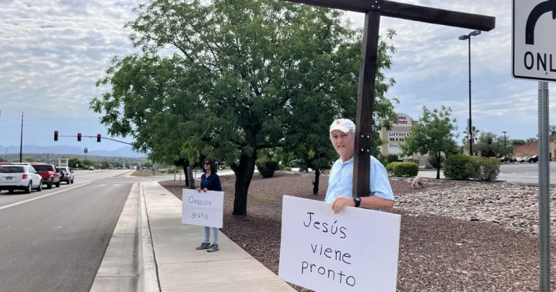 Couple share a message along the road