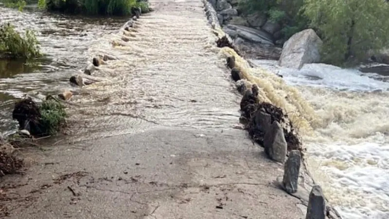 Cyclist rescued after being knocked into rushing water at Sabino Canyon