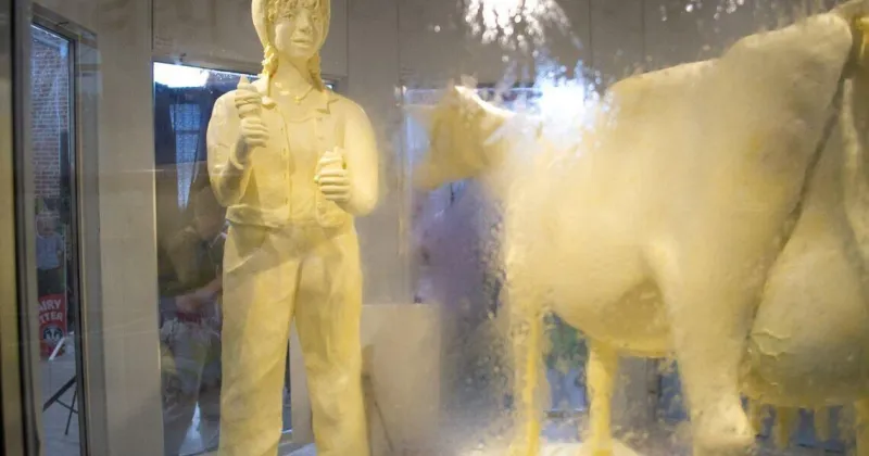 Butter cow helps spread 'Miles of Smiles' State Fair theme