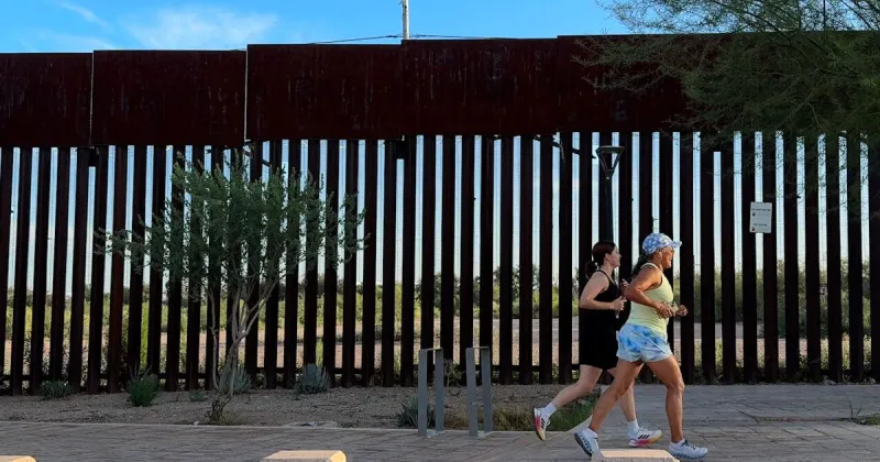 Opinion: At the border, a race that runs against the wall's message of division