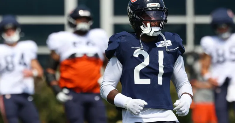 Ben Johnson says Chicago Bears position battles are unsettled, including Cam Lewis vs. Xavier Woods at safety