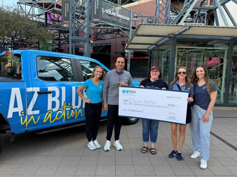 AZ Blue Surprises Local School Nurse with Supplies During Yoga on the Field Event