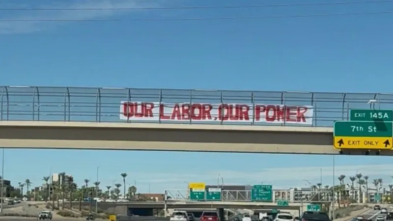Giant Labor Day banners over I-10 call for social justice