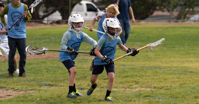 NAU lacrosse volunteers help launch Northern Arizona's first youth league play day