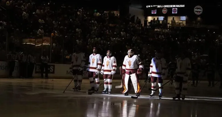 ASU hockey team honors Matthew Mayich with yellow ribbons, falls to Holy Cross in home opener
