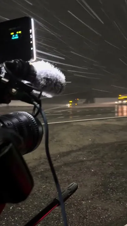 Snow falling along I-70 in mountains (Video)
